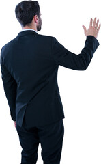 Rear view of businessman pretending to touch invisible screen