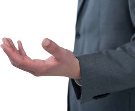 Midsection of businessman holding invisible object against white background