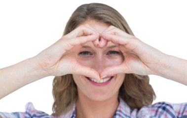 Smiling hipster doing heart shape with her hands