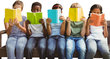 Children reading books at park