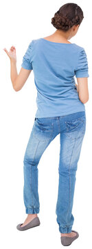 Pretty brunette playing air guitar