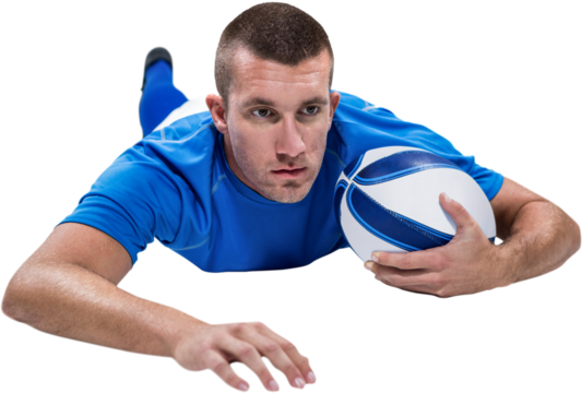 Rugby player looking away while lying in front with ball - Powered by Adobe