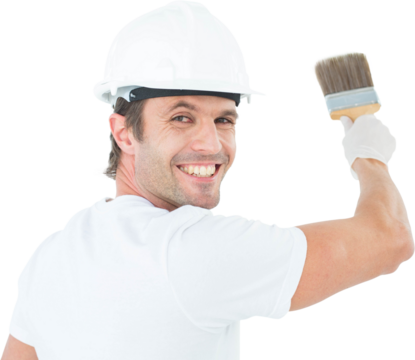 Portrait of happy man using paintbrush