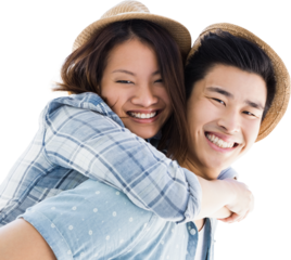 Portrait of happy man giving piggyback ride to woman