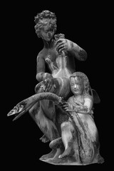 Mighty goddess of the love Aphrodite (Venus) and Cupid on swan. Ancient statue on black background. Black and white vertical image. © zwiebackesser