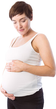 Relaxed pregnant woman holding belly