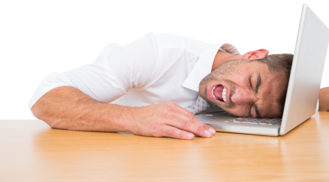 Businessman screaming put his head on laptop