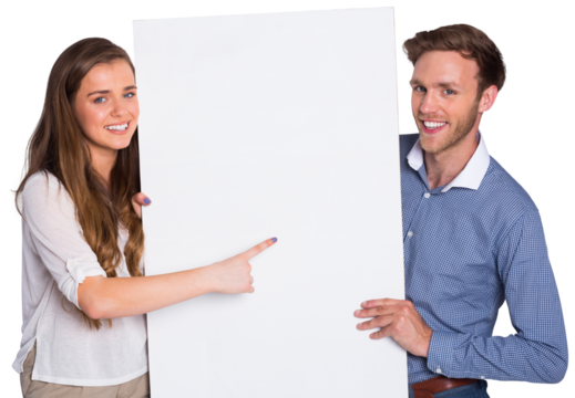 Happy young couple with blank board