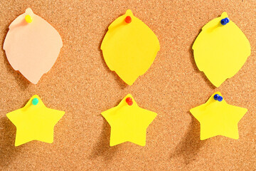 Pinned sticky notes on board