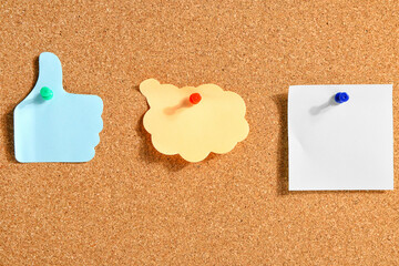 Pinned sticky notes on board