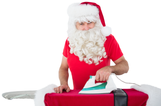 Happy santa claus ironing his jacket - Powered by Adobe