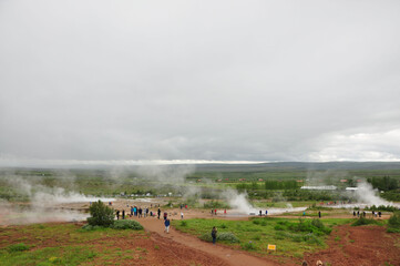 Aerial view of group of people around the Strokkur geyser in Iceland