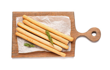 Wooden board with tasty Italian Grissini on white background