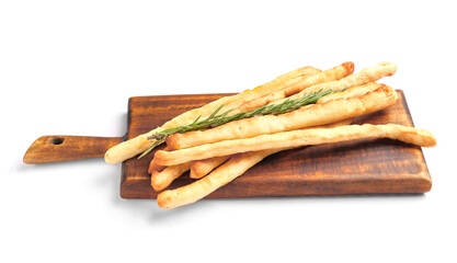 Wooden board with tasty Italian Grissini on white background