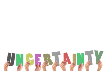 Cropped hands holding colorful alphabets forming uncertainty