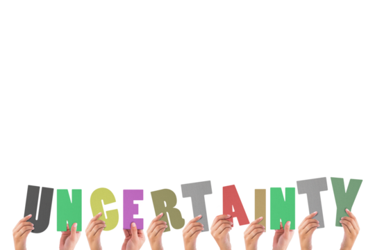 Cropped hands holding colorful alphabets forming uncertainty