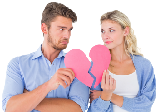 Couple holding two halves of broken heart