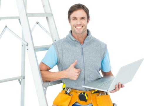 Repairman showing thumbs up sign while using laptop