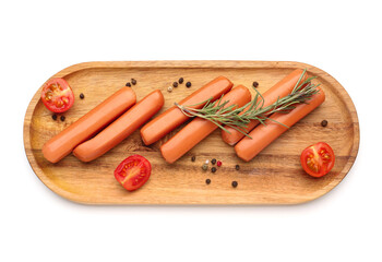 Wooden board with tasty sausages isolated on white background