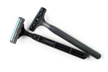 Disposable razors on a white background. Two plastic razors.