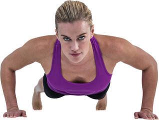 Muscular woman doing push ups 