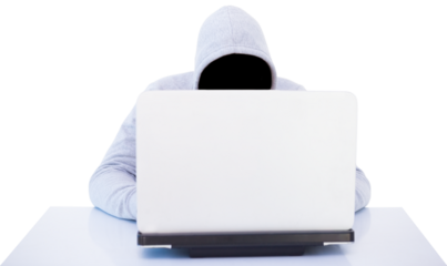 Hacker using white laptop at table