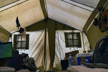 Inside the tent of the geological expedition. The work of the expedition in the forest, life inside the tent