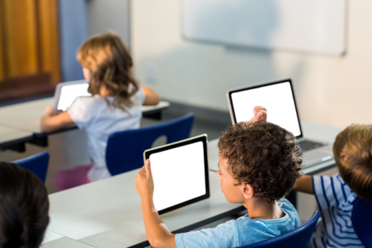 Students using digital tablet 