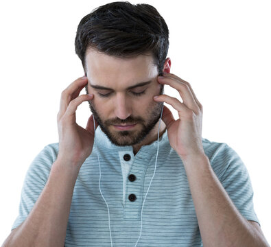 Stressed man listening to headphones