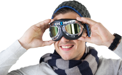 Smiling man wearing aviator goggles