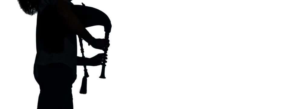 Scottish Bagpipe player in silhouette
