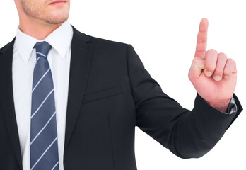 Unsmiling businessman pointing his finger