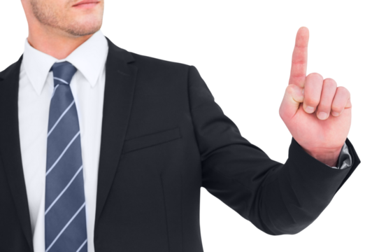 Unsmiling businessman pointing his finger