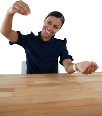 Businesswoman pretending to work on an invisible object