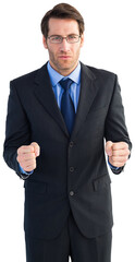 Angry businessman with closed fists looking at camera