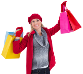 Blonde in winter clothes holding shopping bags