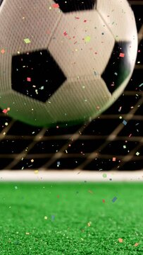Animation of confetti over soccer ball at stadium