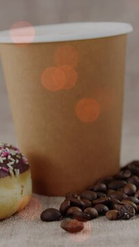 Animation of coffee and donut over light spots