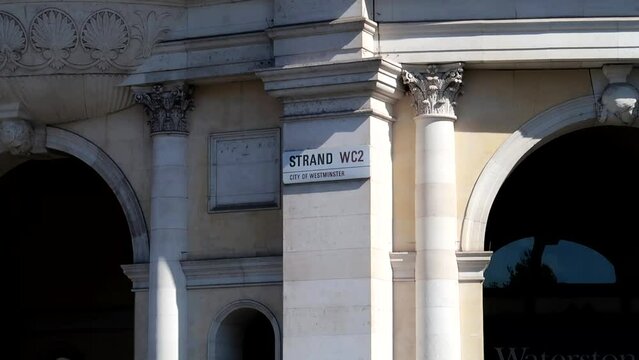 Strand Street sign in a wall at City of Westminster, Trafalgar Square. London