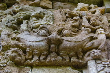 Face of the ancient deities carved in stone.Bali
