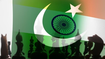 Computer graphics and double exposure. The translucent flag of Pakistan flutters against the background of the flag of India, chess pieces move between them. The concept of confrontation
