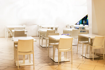 stylish minimalist interior in white color with white furniture. horizontal