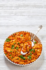 nacho chicken cheese casserole in baking dish