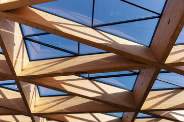 Modern roof construction made of wood and glass