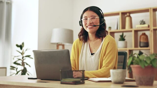 Friendly, remote work or portrait of woman in call center consulting at customer services on laptop. Smile, crm or happy Asian girl consultant in telemarketing or telecom company with headset mic