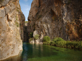 The scenic view of Guver canyon, beautiful clear water, Turkey Antalya, ormed through abrasion of...