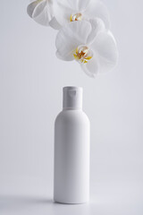 White cosmetic bottle of shampoo or lotion mock-up