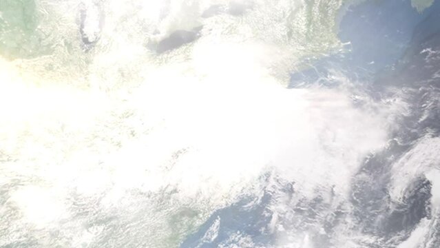 Earth zoom in from outer space to city. Zooming on Charlottesville, Virginia, USA. The animation continues by zoom out through clouds and atmosphere into space. Images from NASA