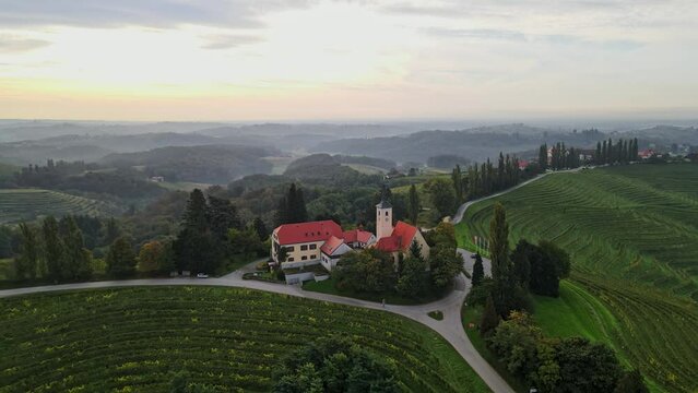 Aerial 4K drone footage of Jeruzalem during the sunrise. Jeruzalem is a small settlement in the Municipality of Ljutomer in northeastern Slovenia.