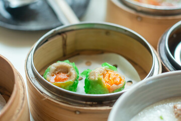 Dim sum in bamboo steamer, chinese cuisine
